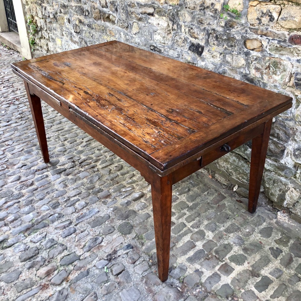 A French 19th century extending farmhouse kitchen table  View II