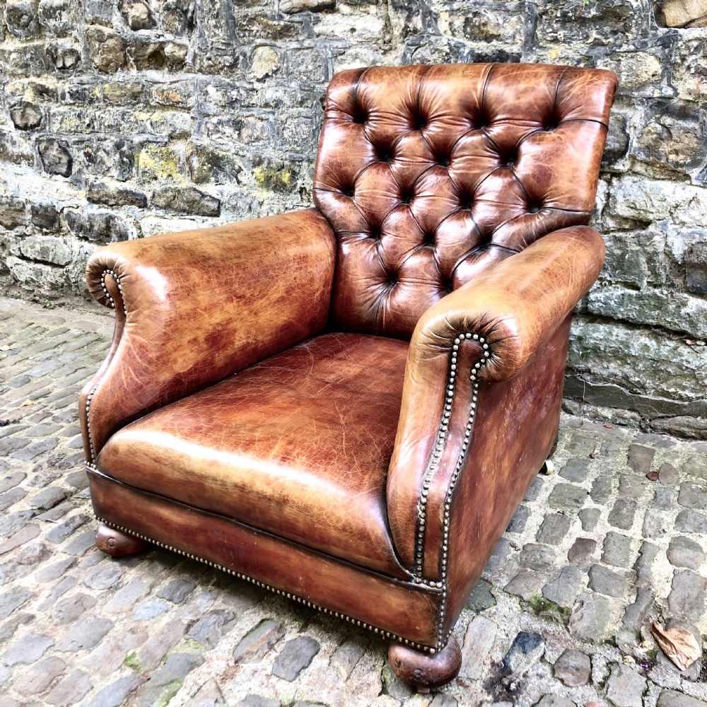 A late Victorian leather armchair 