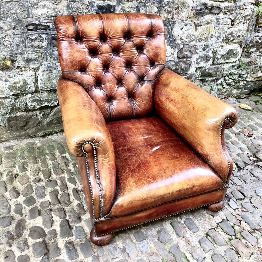 A late Victorian leather armchair  View III