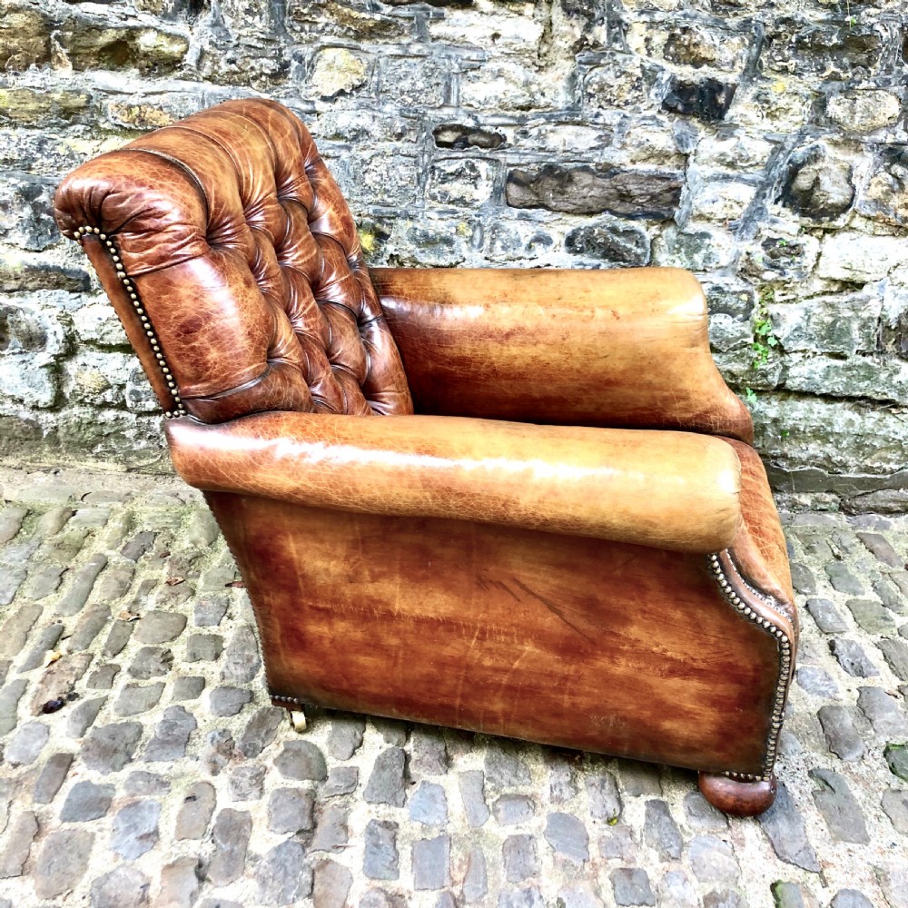 A late Victorian leather armchair  View IV