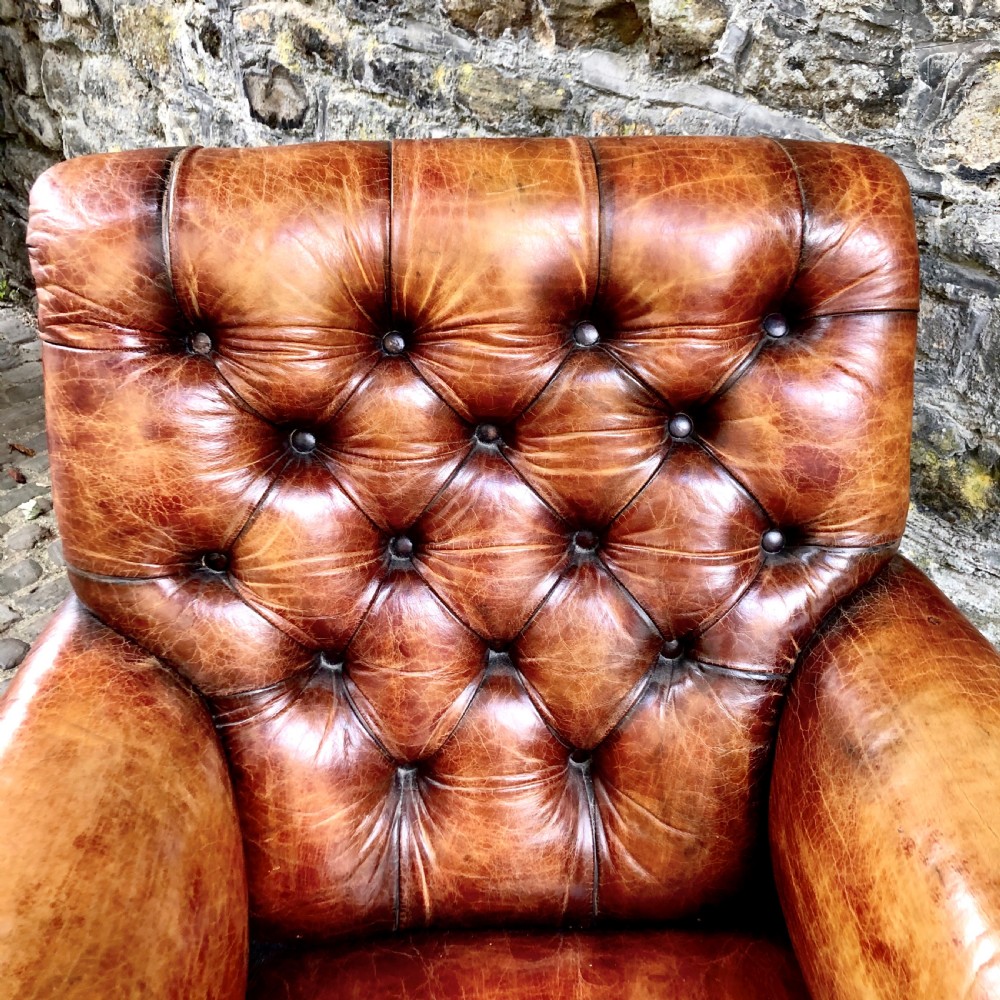 A late Victorian leather armchair  View VII