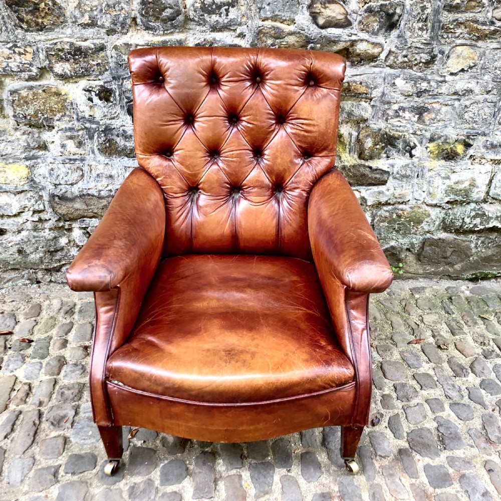 A late Victorian leather armchair 