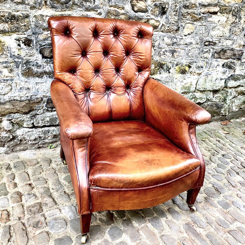 A late Victorian leather armchair  View V
