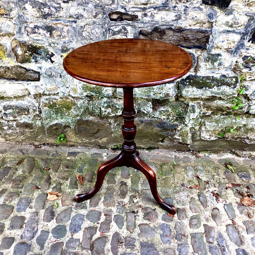 A George III mahogany and fruitwood wine table 