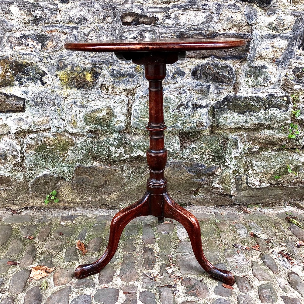 A George III mahogany and fruitwood wine table  View II