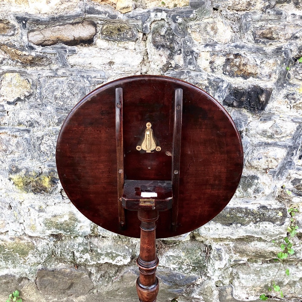 A George III mahogany and fruitwood wine table  View V