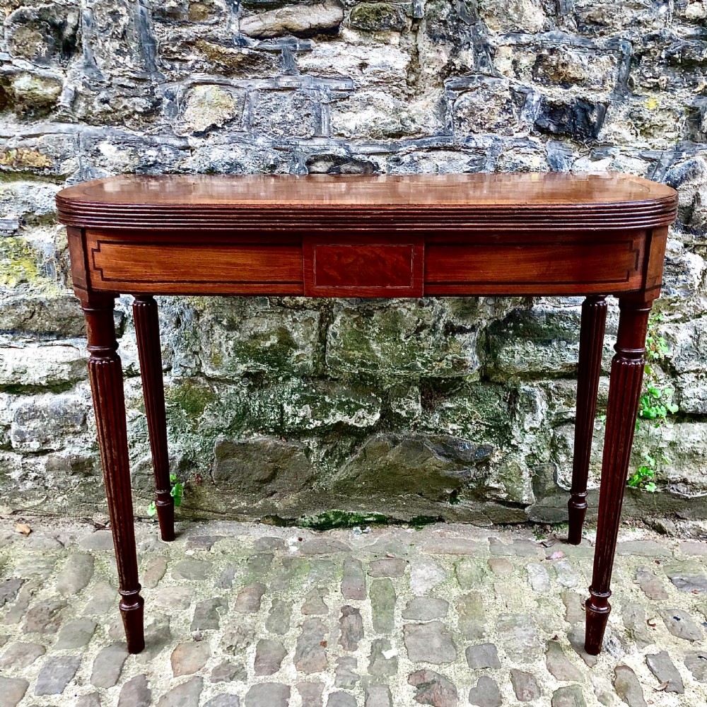 A George III mahogany card table  View II