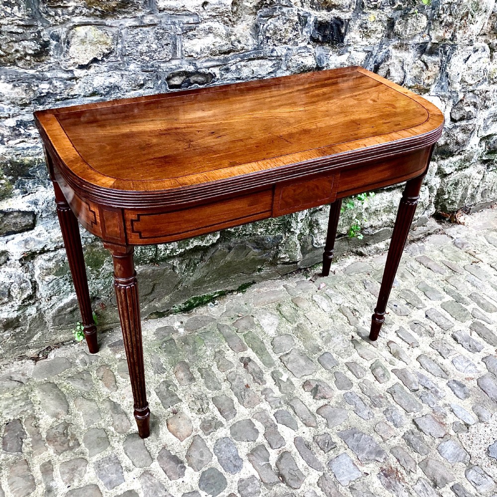 A George III mahogany card table  View III