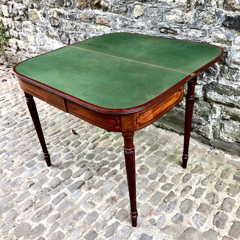A George III mahogany card table  View VI