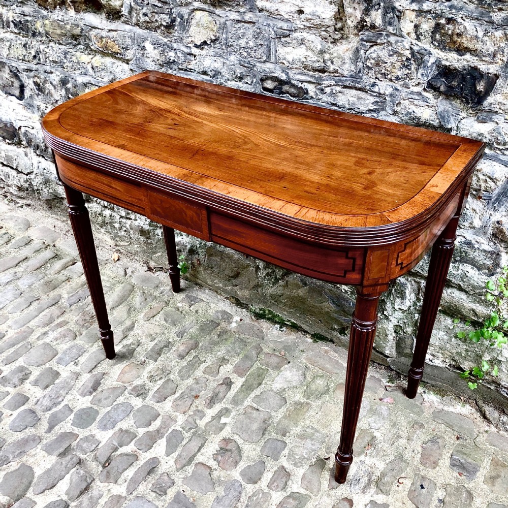 A George III mahogany card table  View VIII