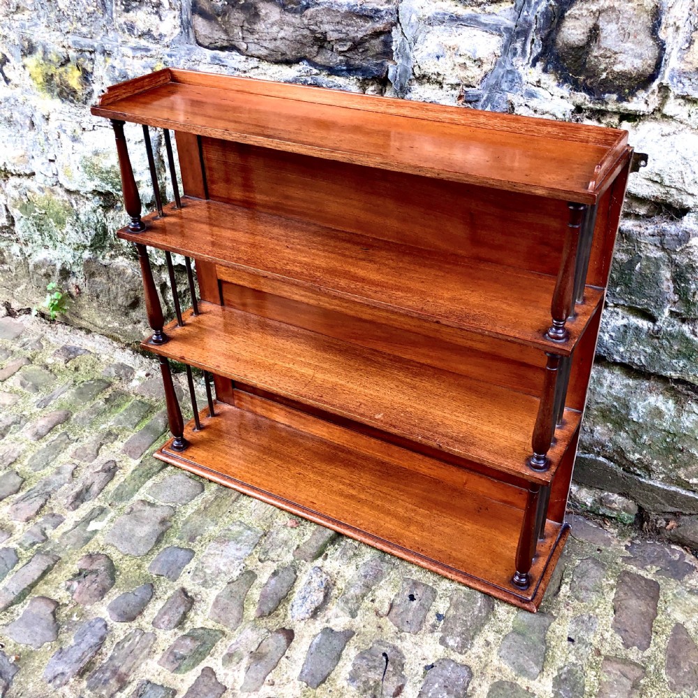 An early 19th century set of hanging shelves View II