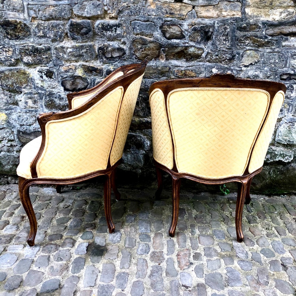 A pair of late 19th century French tub armchairs  View V