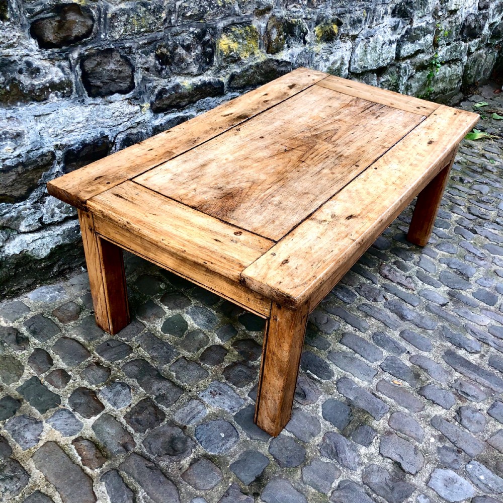 An early 20th century sycamore low or coffee table  View V