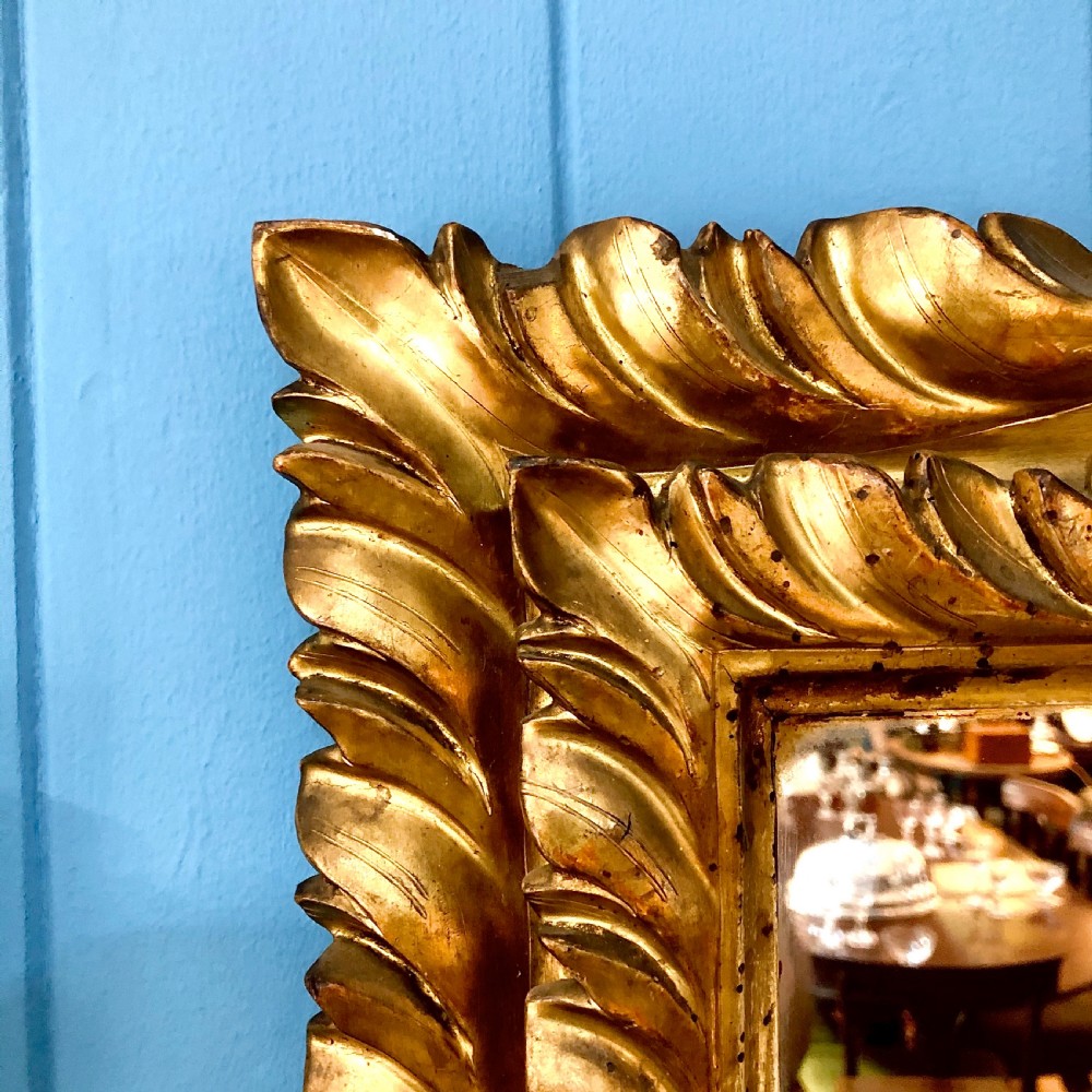 A mid 18th century Italian giltwood mirror  View II