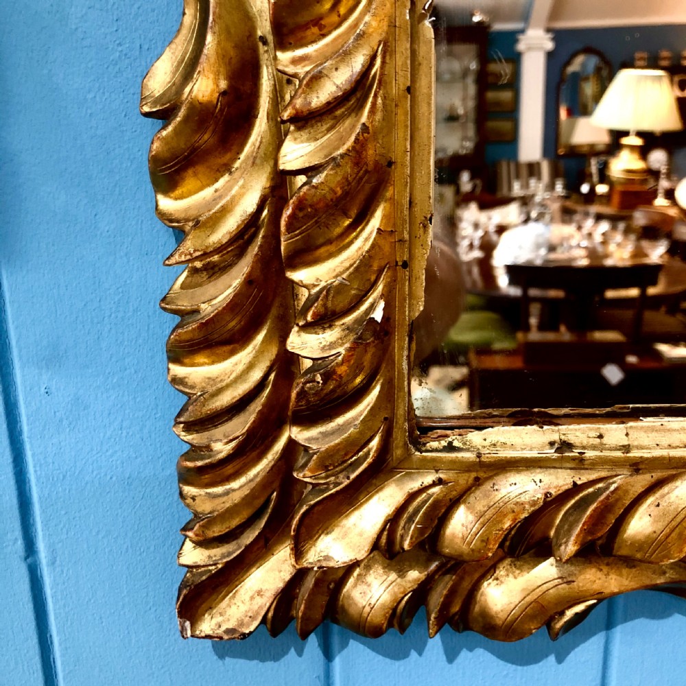 A mid 18th century Italian giltwood mirror  View III