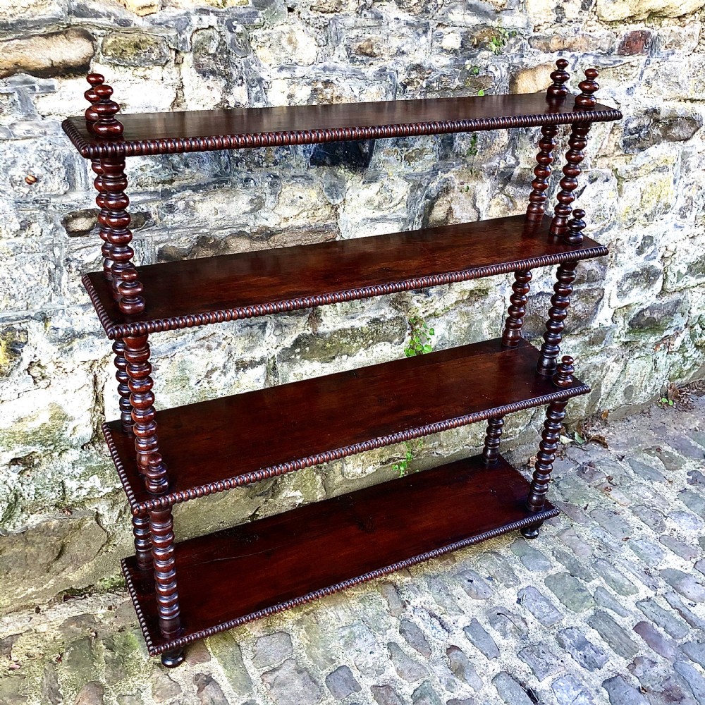 A mid 19th century open bookcase 