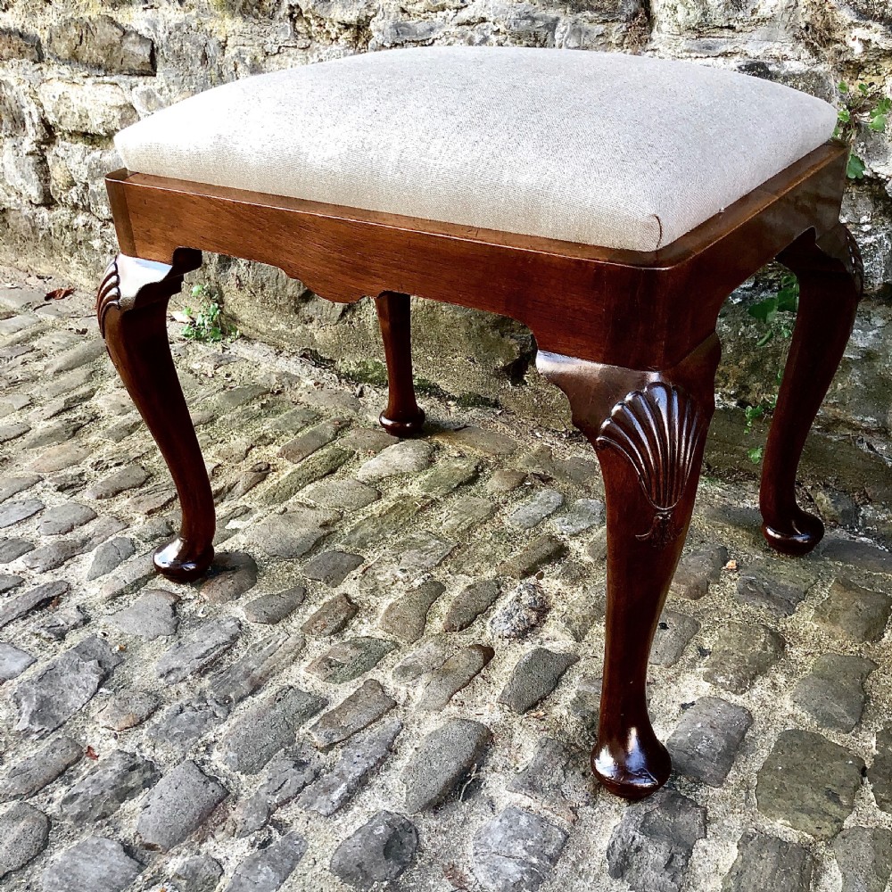 A 19th century mahogany stool View II