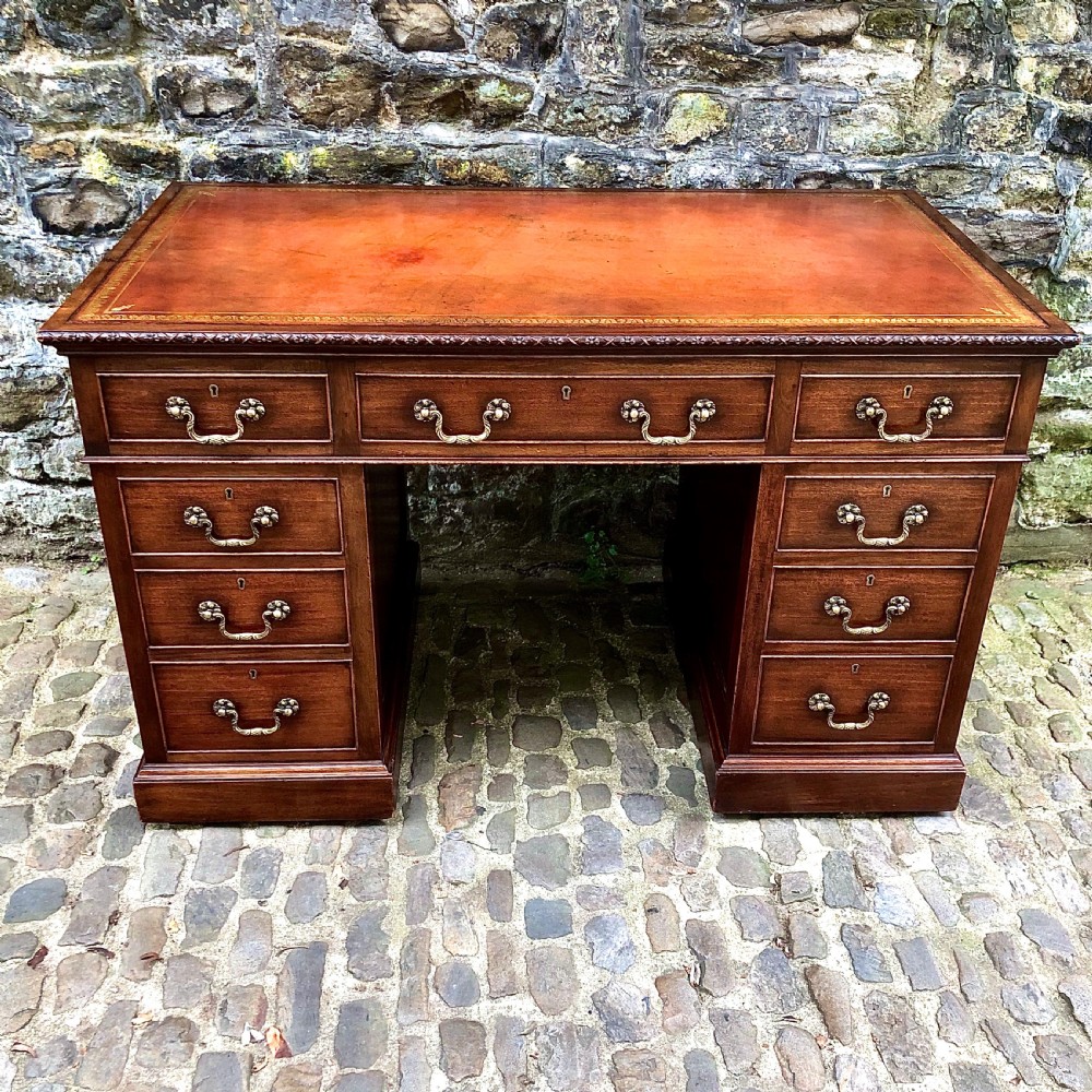 An Edwardian mahogany pedestal desk  View II