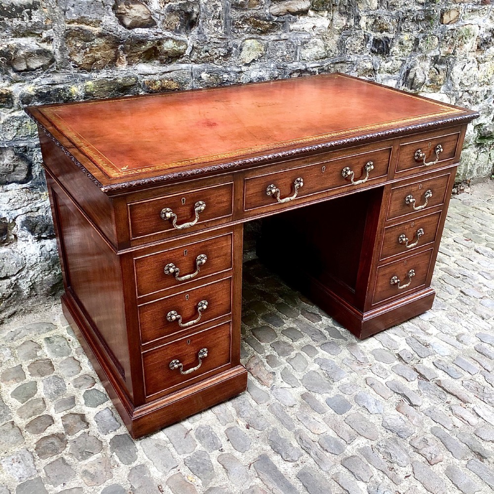 An Edwardian mahogany pedestal desk  View III
