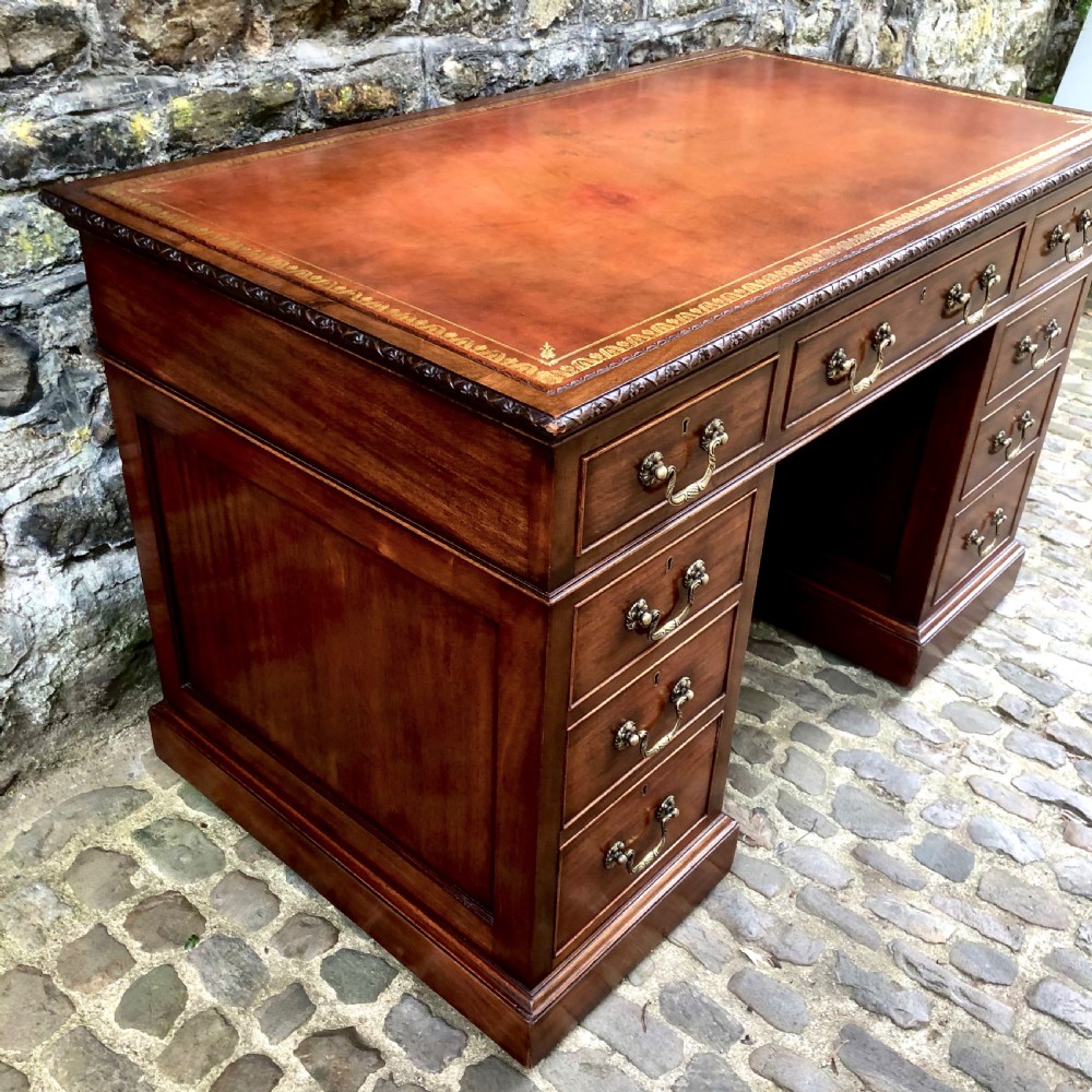 An Edwardian mahogany pedestal desk  View V