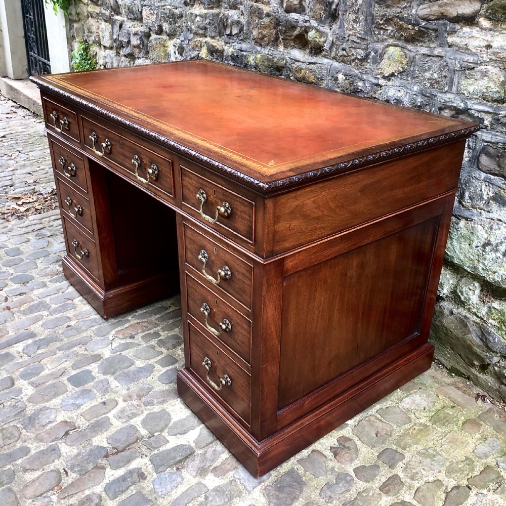 An Edwardian mahogany pedestal desk  View VI
