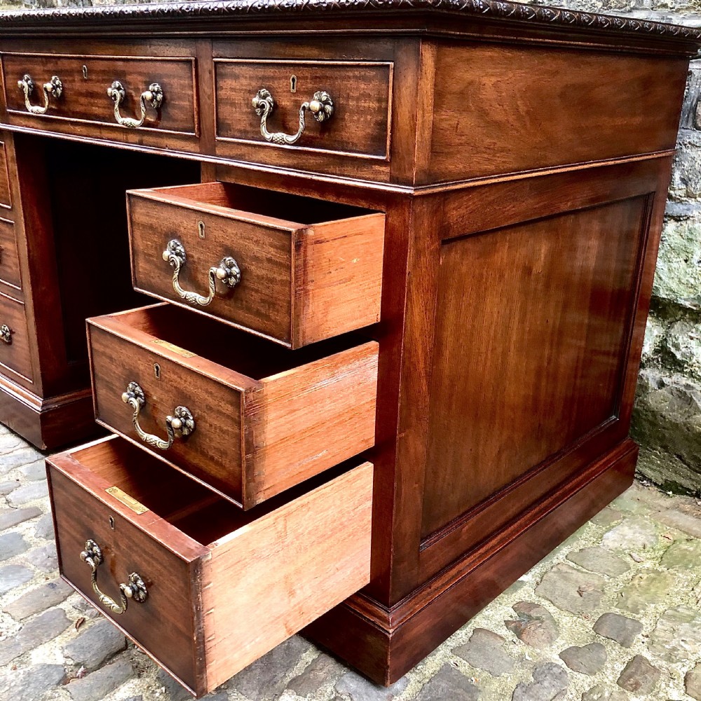 An Edwardian mahogany pedestal desk  View VII