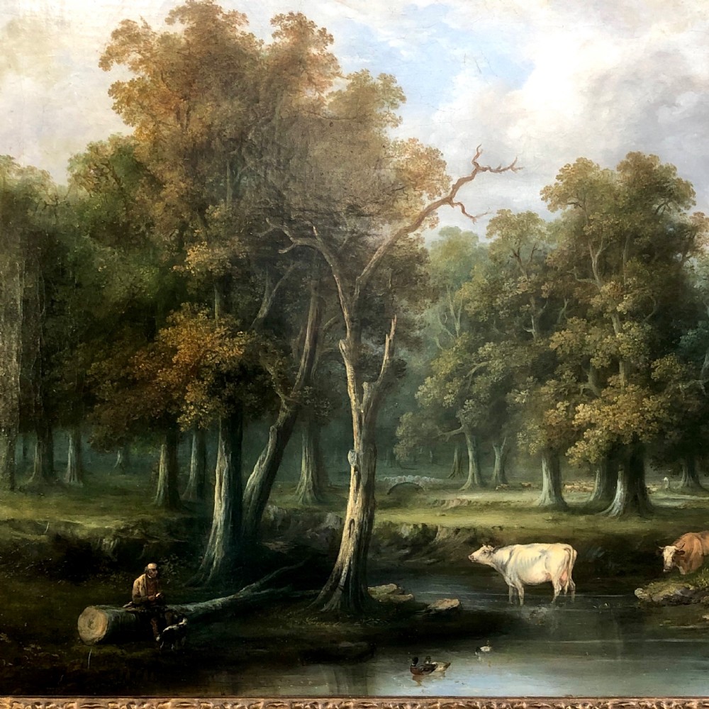 A late 18th-century oil painting on canvas depicting a rural landscape with cattle standing in a stream, surrounded by mature trees, housed in a moulded giltwood frame. View IV