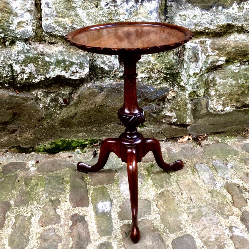 A pair of small Edwardian mahogany tripod wine tables  View IV