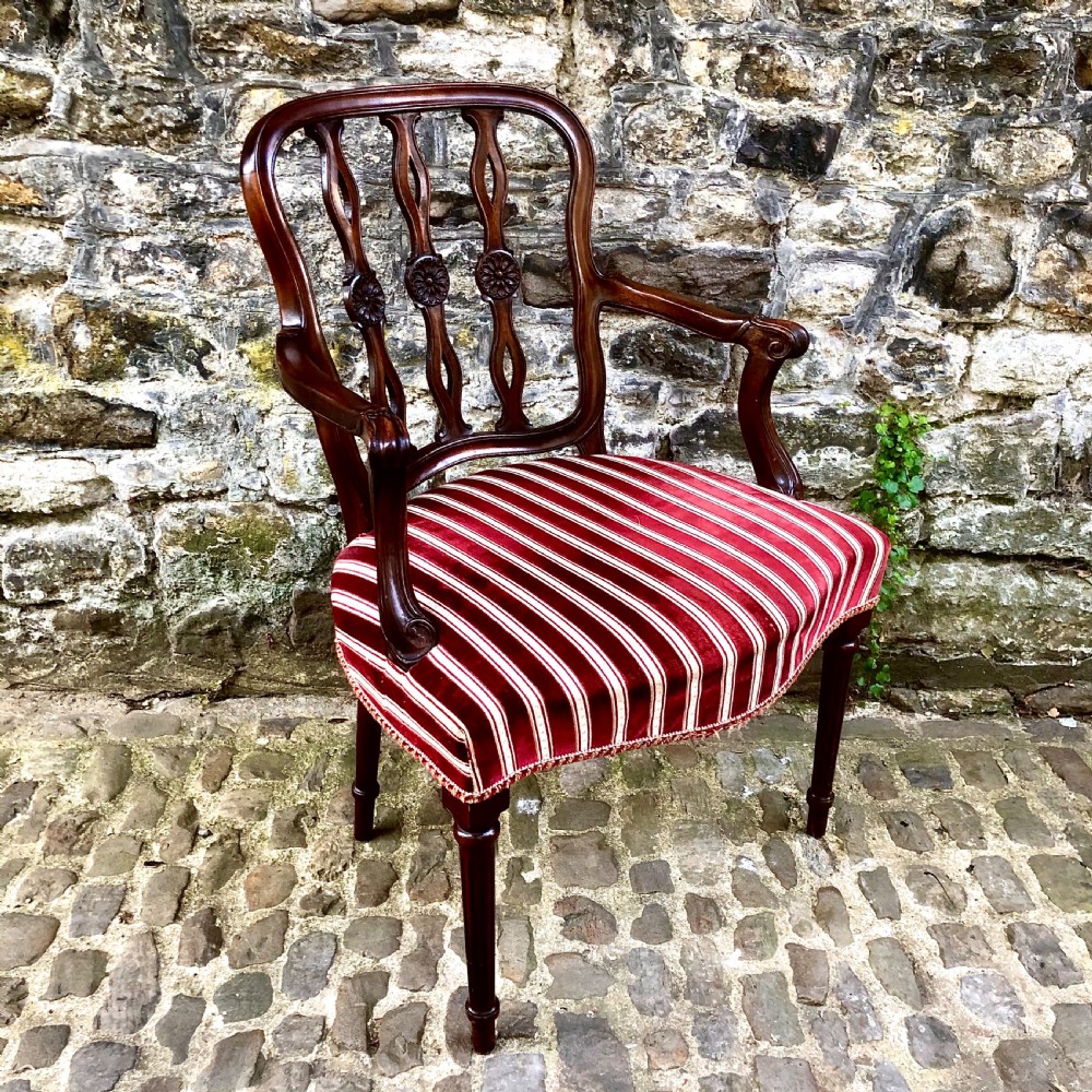 An Edwardian mahogany elbow or desk chair  View IV