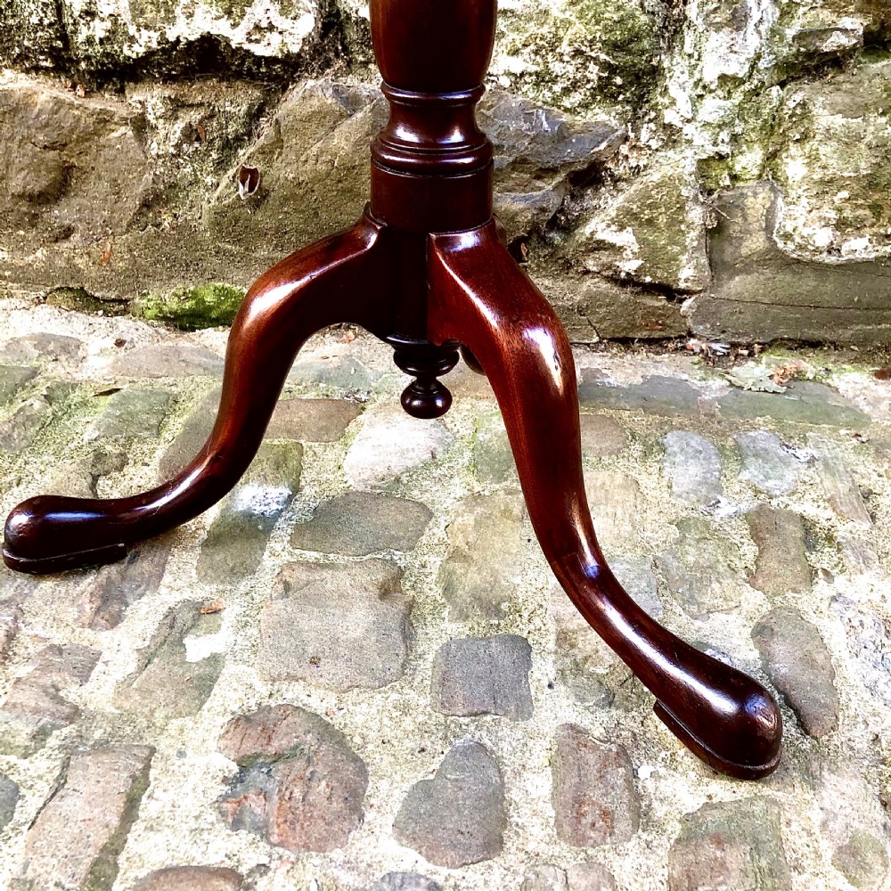 A mahogany tripod wine table in the George III style View IV