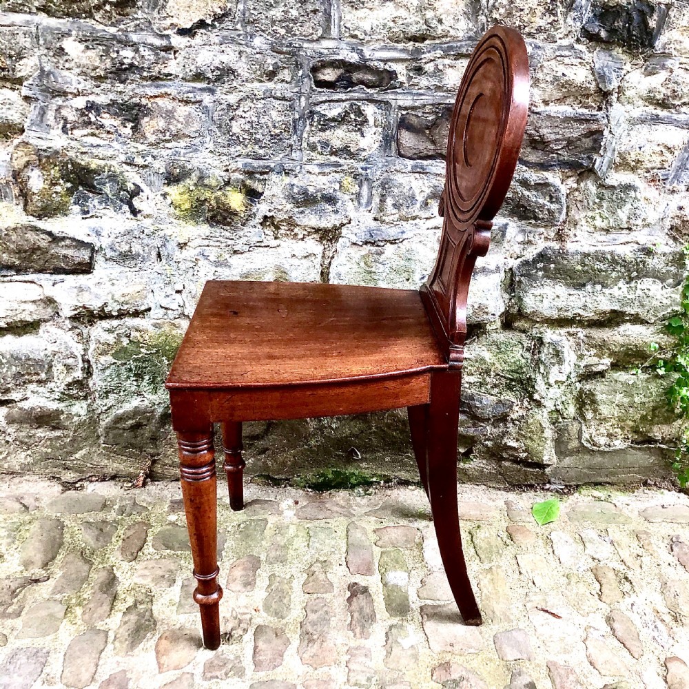 A Regency mahogany hall chair  View V