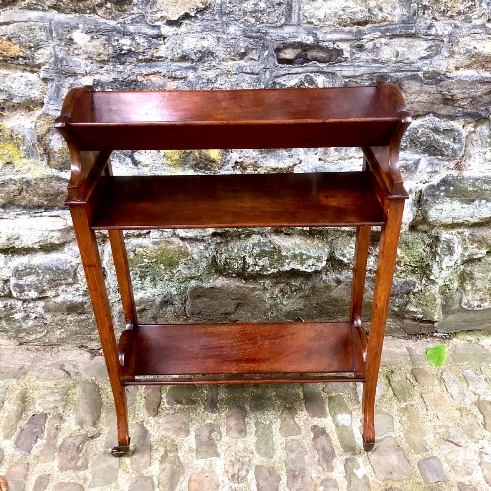 An Edwardian mahogany two tier book trough  View II