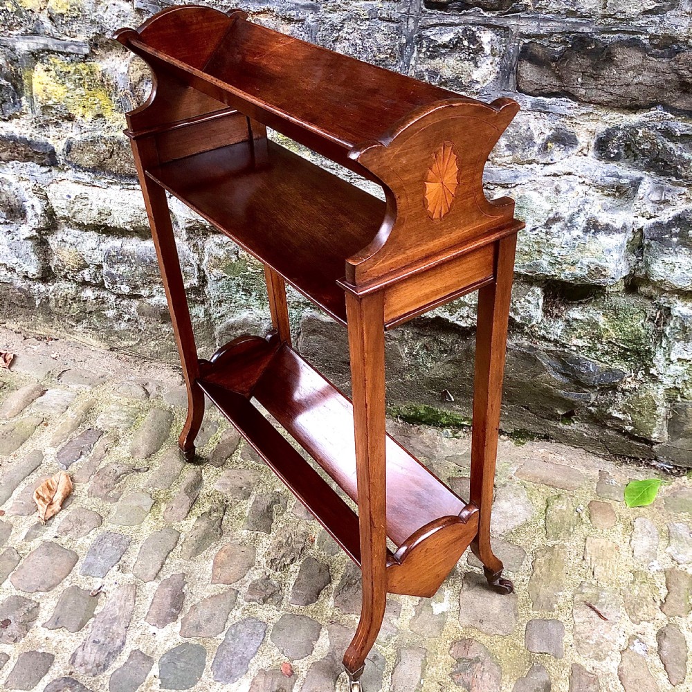 An Edwardian mahogany two tier book trough  View III