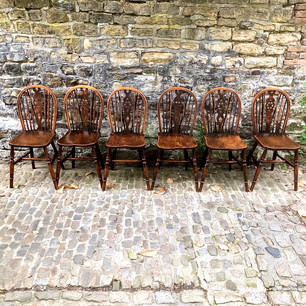 A set of six late 19th century Windsor wheelback chairs