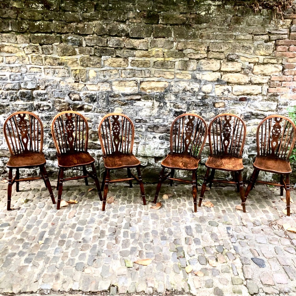 A set of six late 19th century Windsor wheelback chairs View II
