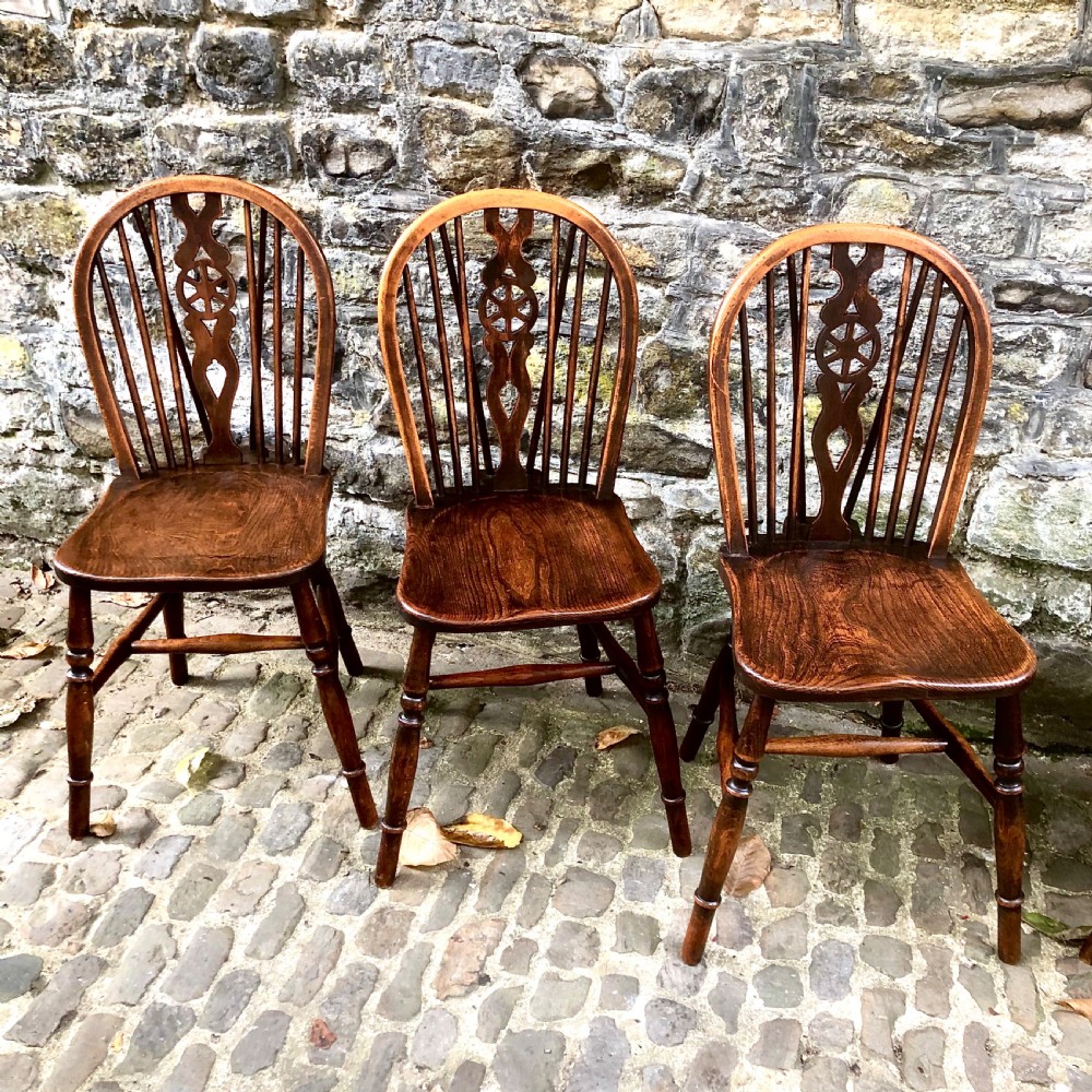 A set of six late 19th century Windsor wheelback chairs View III