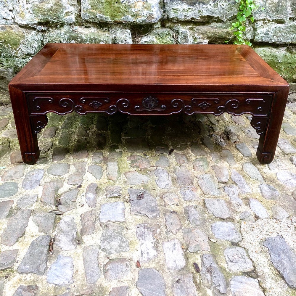 A 19th century Chinese rosewood low table or coffee table. 