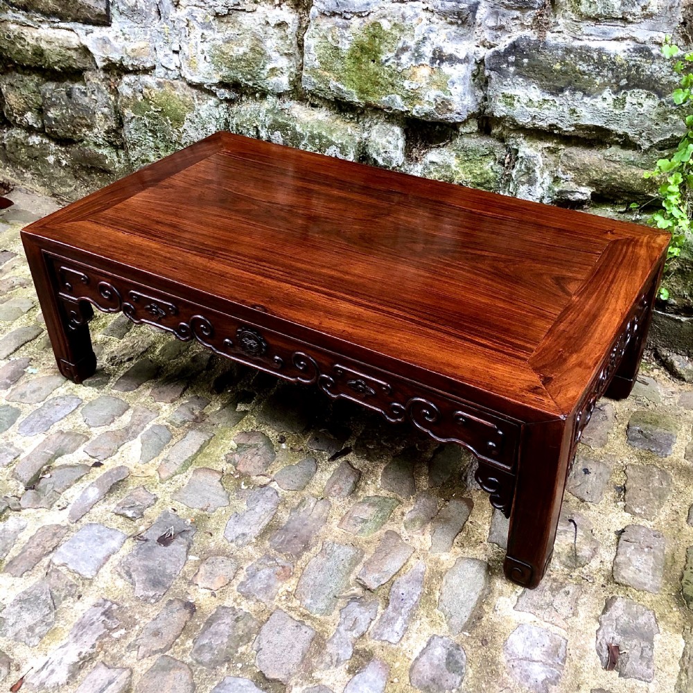 A 19th century Chinese rosewood low table or coffee table.  View II
