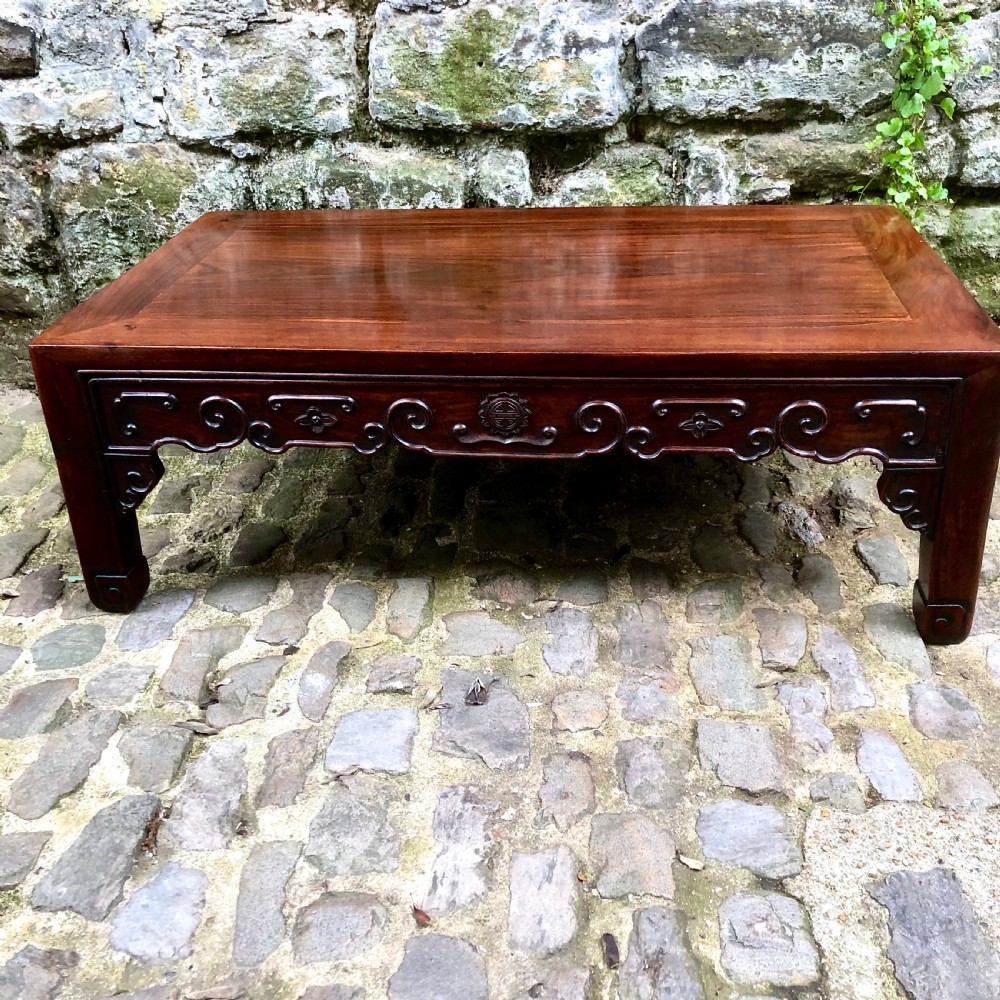 A 19th century Chinese rosewood low table or coffee table.  View III