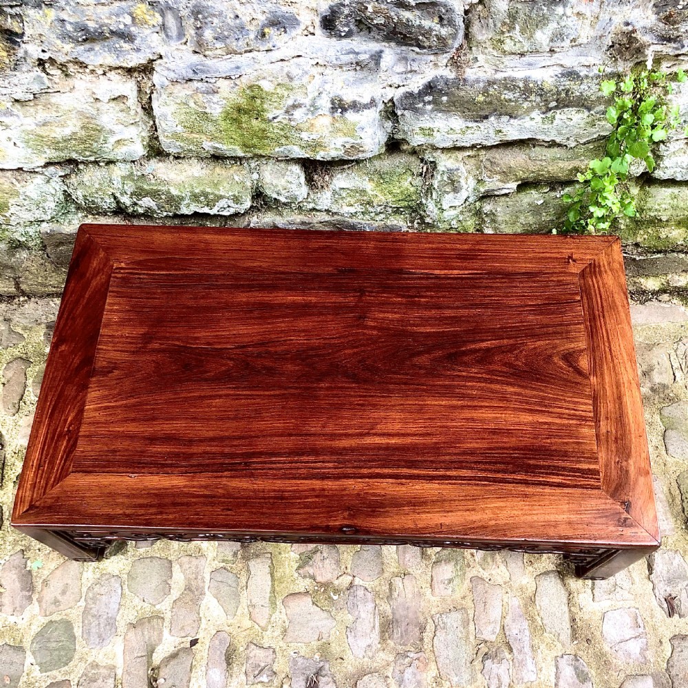 A 19th century Chinese rosewood low table or coffee table.  View IV