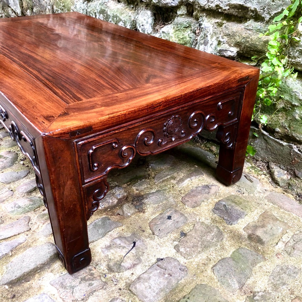 A 19th century Chinese rosewood low table or coffee table.  View V