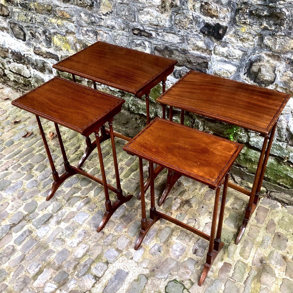 An Edwardian mahogany nest of four tables  View IV