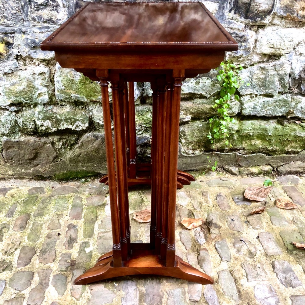 An Edwardian mahogany nest of four tables  View VII