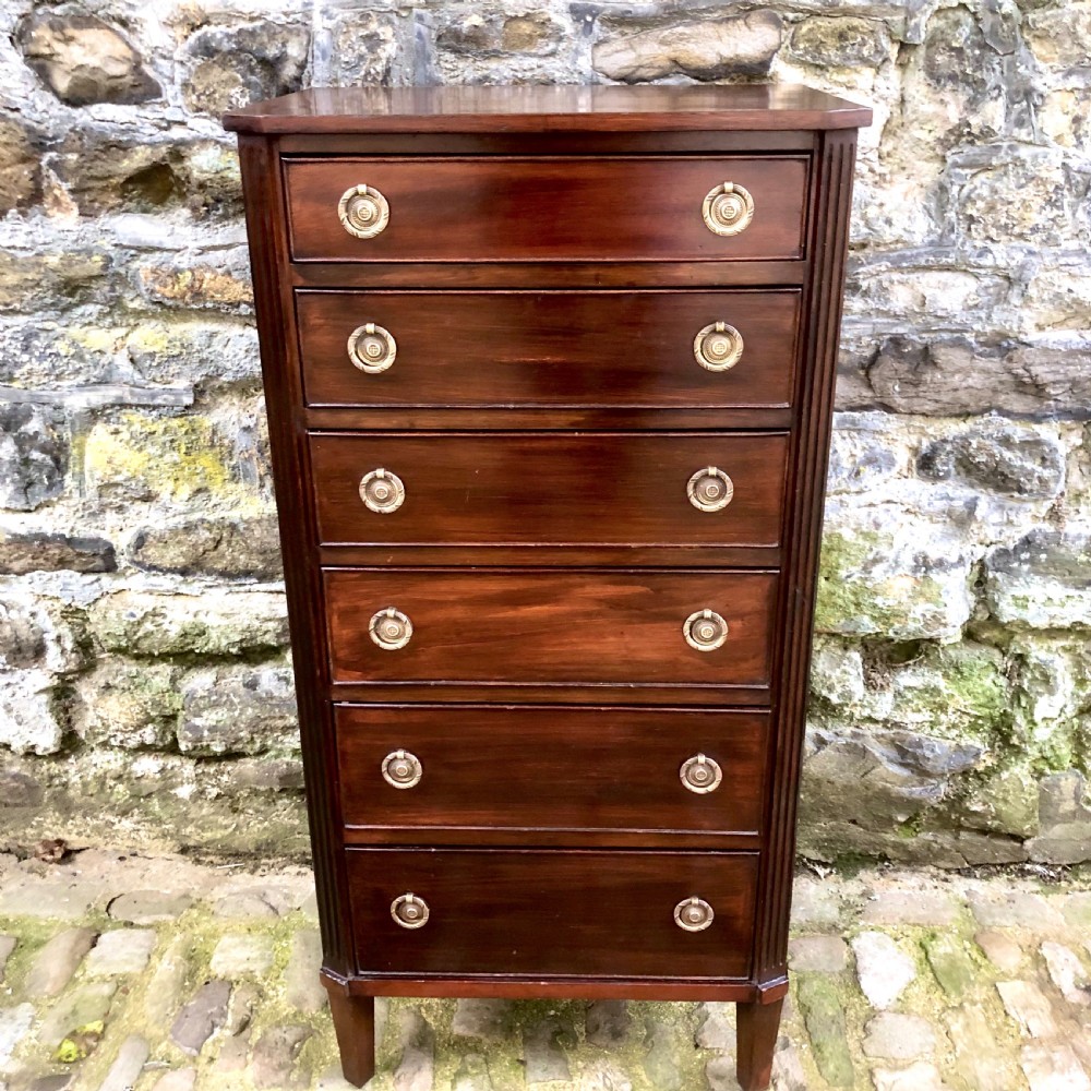 A late 19th century mahogany Wellington chest of drawers 