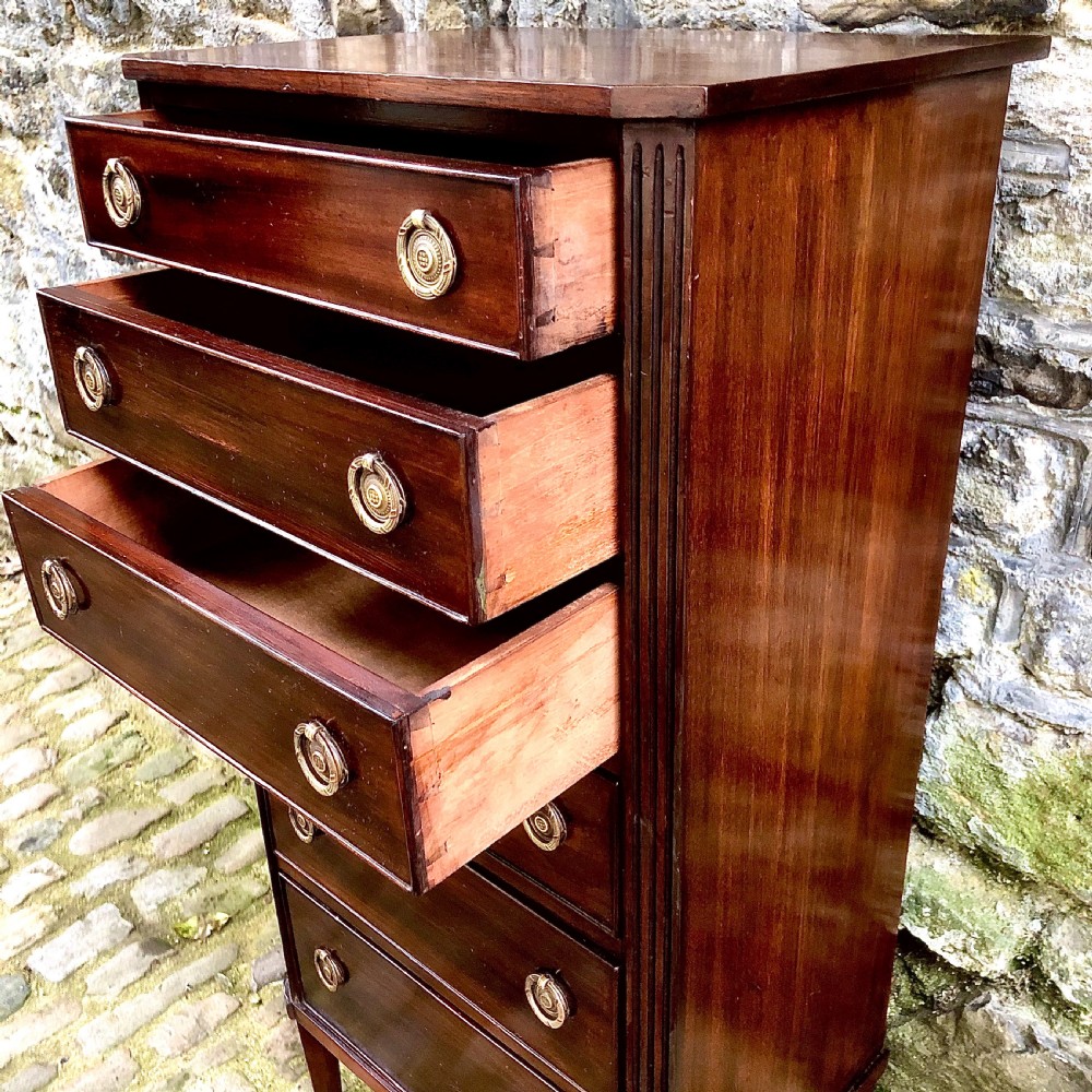 A late 19th century mahogany Wellington chest of drawers  View VI