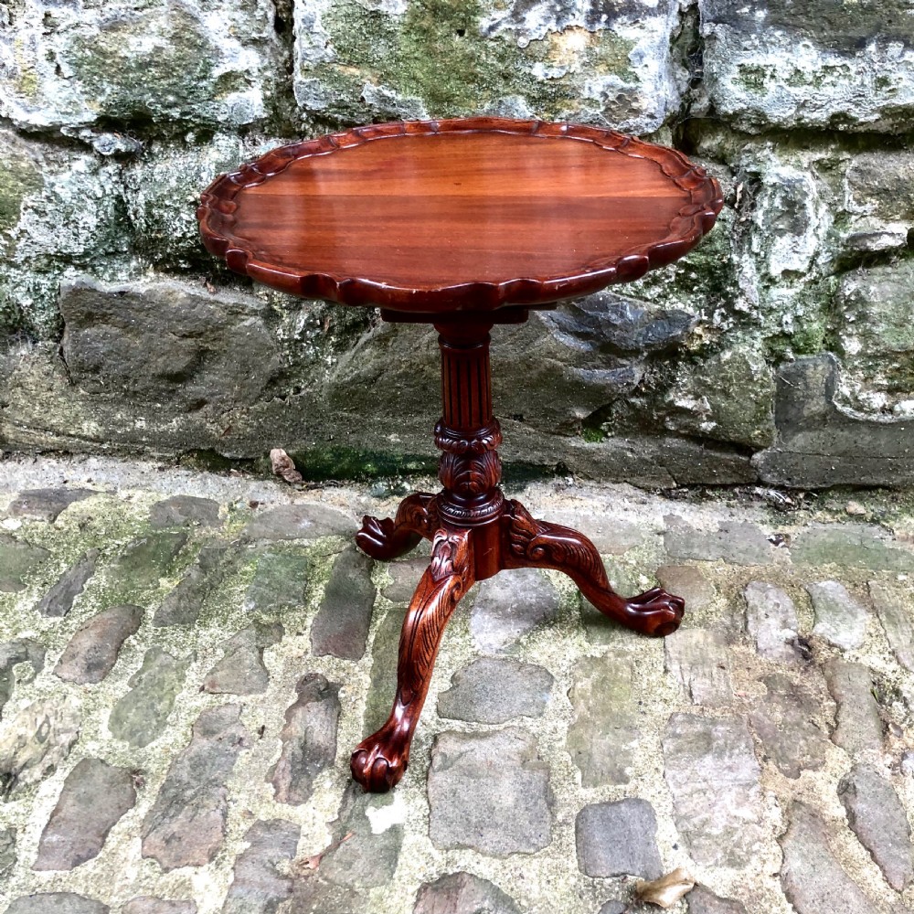 A miniature walnut tilt-top piecrust wine table 