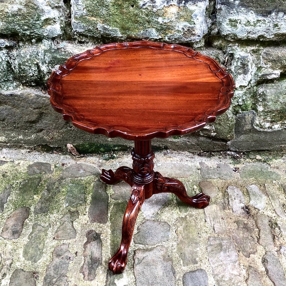A miniature walnut tilt-top piecrust wine table  View II
