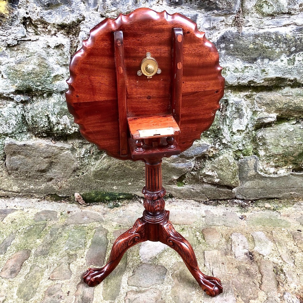 A miniature walnut tilt-top piecrust wine table  View III