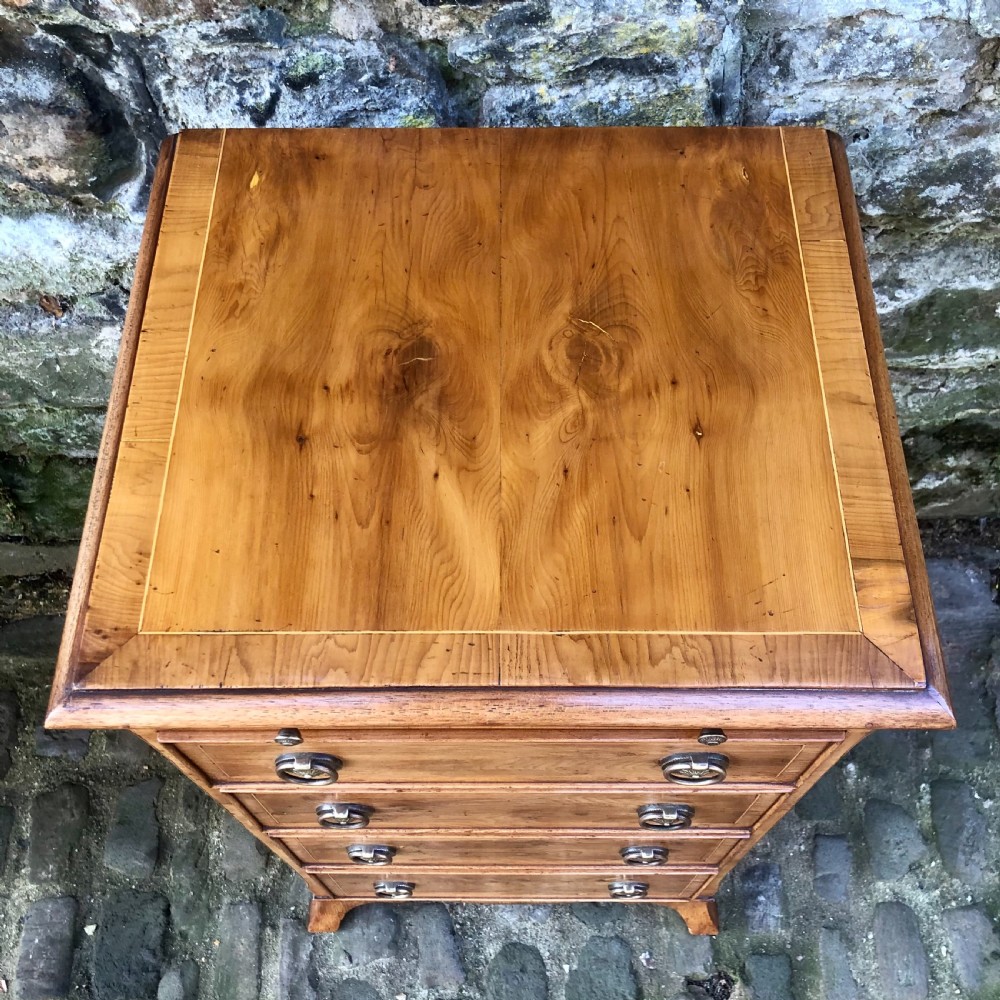 A pair of early 20th century yew wood bedside tables  View VIII