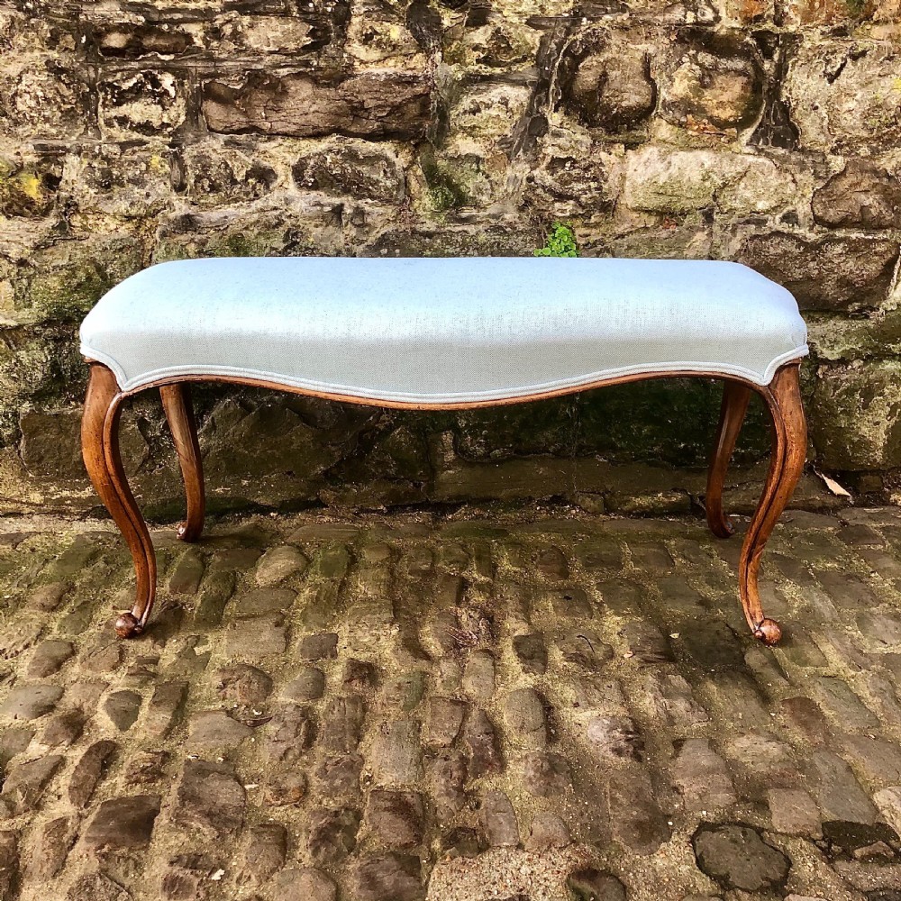A mid Victorian walnut stool or window seat